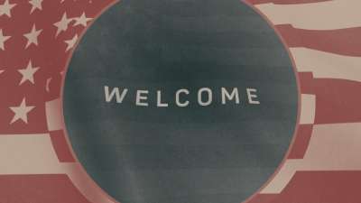 Vintage Waving American Flag Welcome